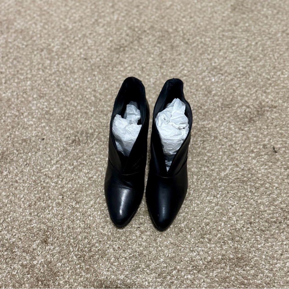 Sleek Black Genuine Leather Ankle Booties for Women
